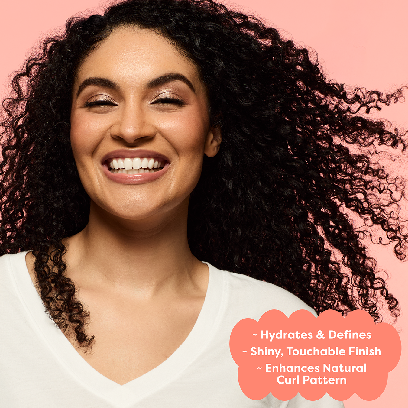 Woman with curly hair against a pink background with text about hair care.